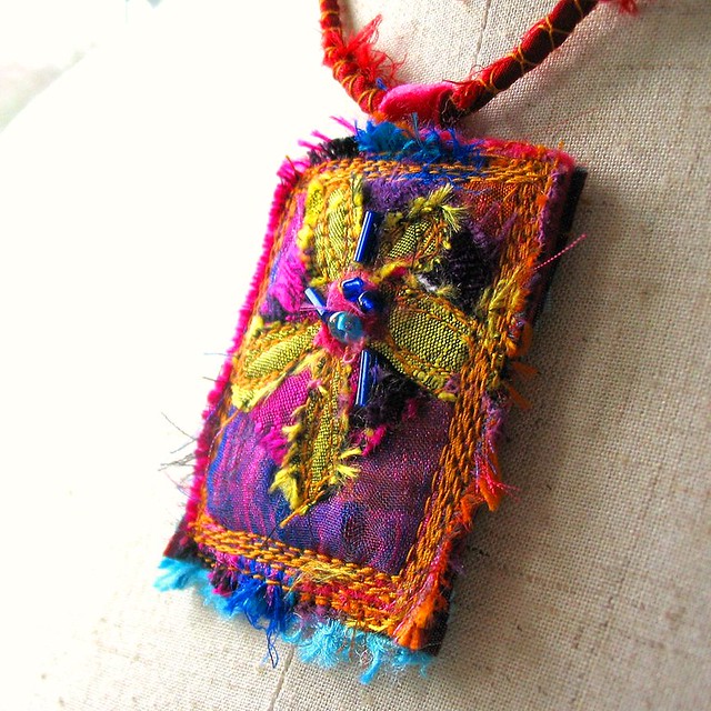 Woven textile pendant necklace